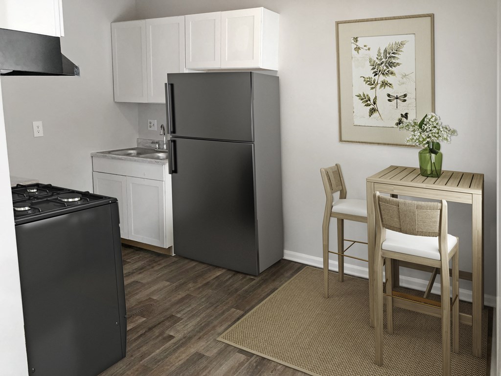 a kitchen and dining area in a 555 waverly unit