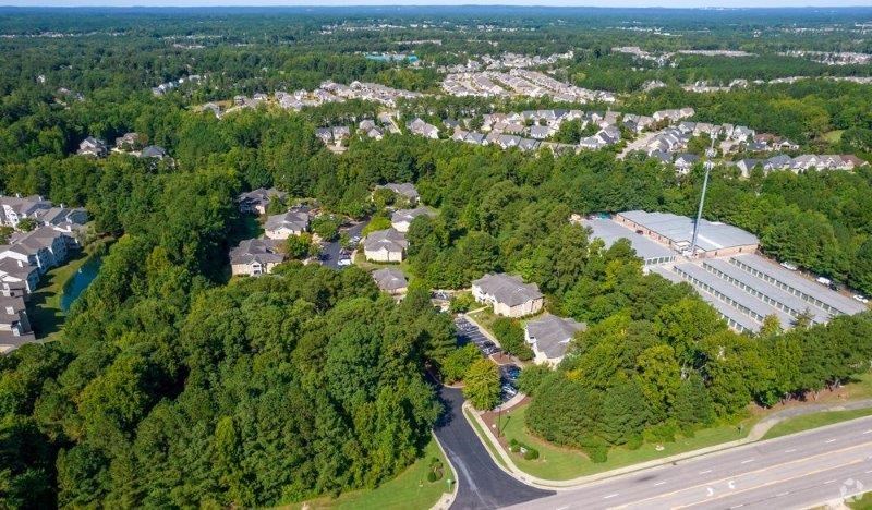 Aerial view of a neighborhood with houses and trees