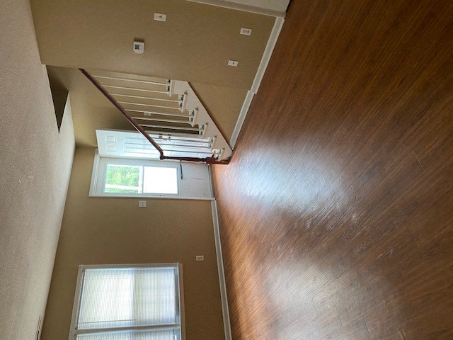 a view of a staircase from the top of it