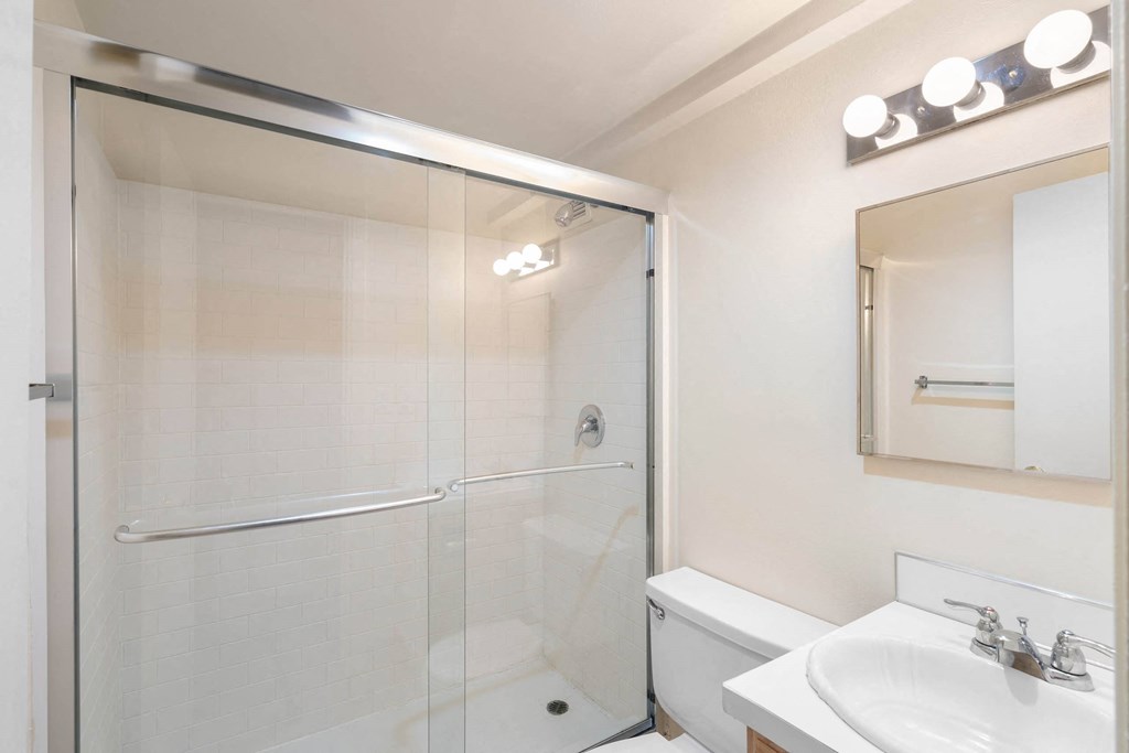a bathroom with a shower and a sink and a toilet at Celio Apartments, Portland, Oregon