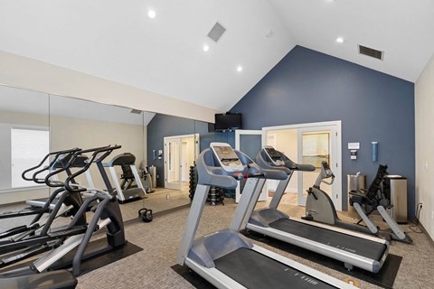 Fitness center with treadmills and cardio equipment at Oriel Apartments, Portland
