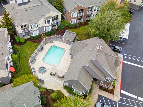 Aerial view of pool area with hot tub and patio at Oriel Apartments, Portland, 97225