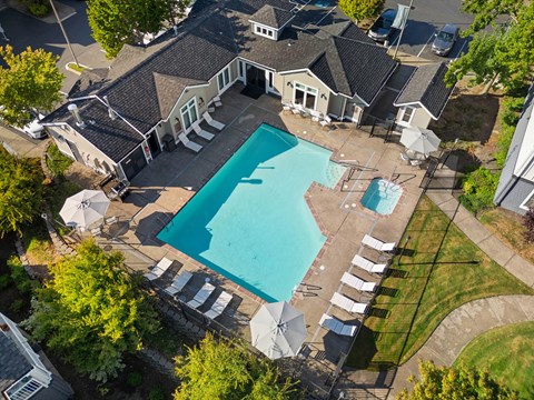 Aerial view of pool area with sundeck at Summer Creek Apartments, Oregon