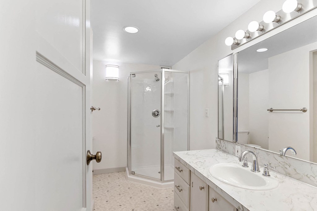 a bathroom with a sink and a shower at Vista St. Clair, Portland