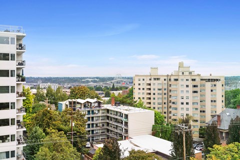 an aerial view of a city with tall buildings and trees at Vista St. Clair, Portland, OR