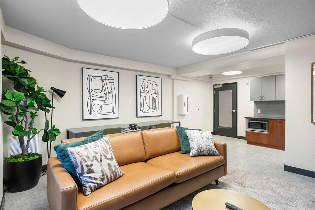 a living room with a couch and a table at Vista St. Clair, Portland, 97205