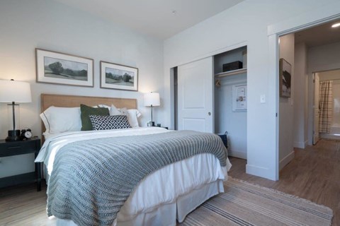 Bedroom with closet and neutral decor at Sonder Fields Apartments, Oregon
