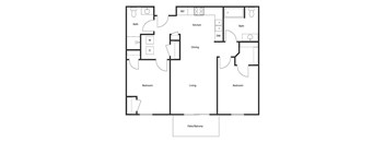 A floor plan of a house with a kitchen, dining and living room.