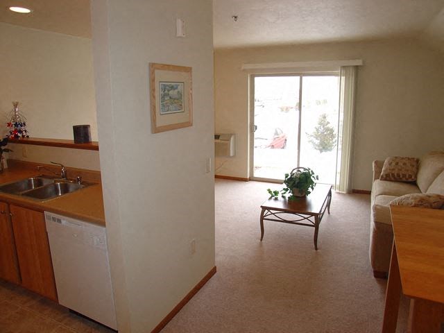 a living room with a couch and a table