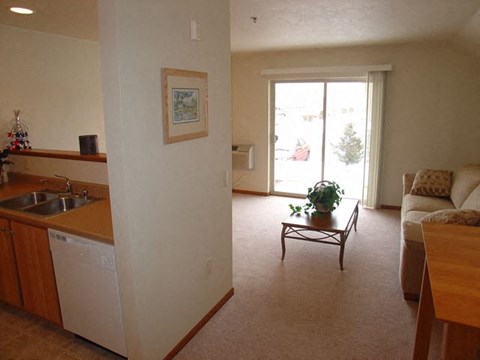 a living room with a couch and a table