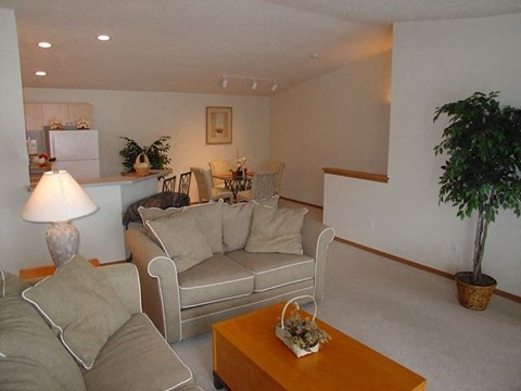 a living room with a couch and a table