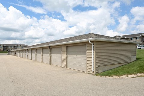 a row of garages in front of some houses