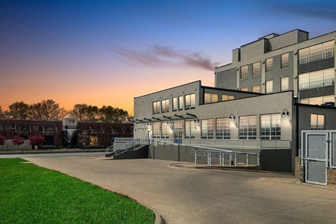 a large building with a ramp in front of it