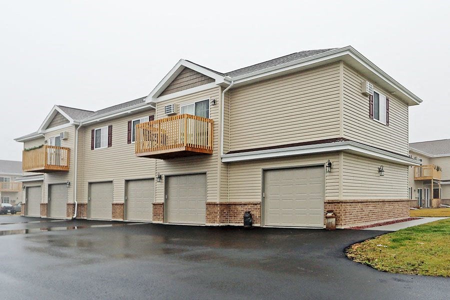 A large house with a balcony and a garage.