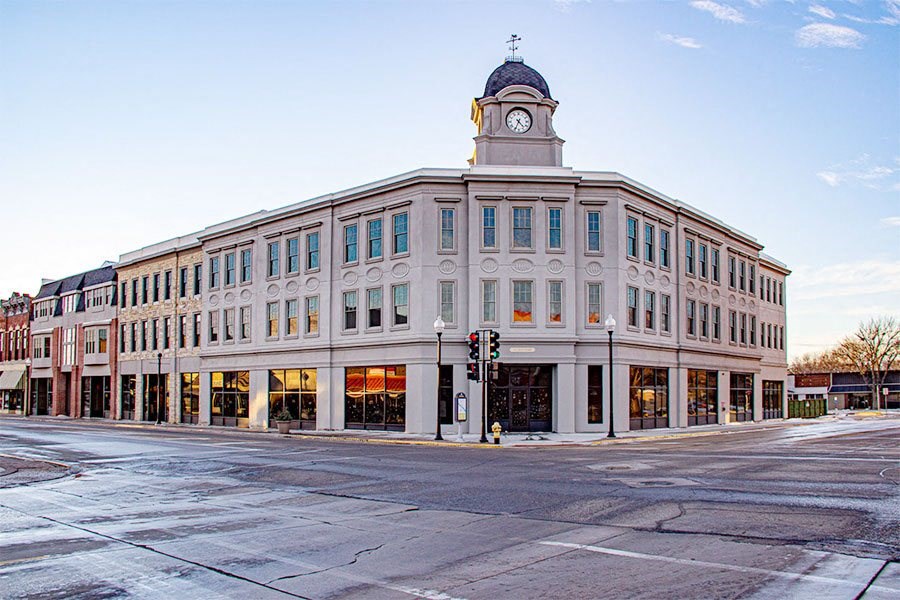 a large building with a clock tower on the top of it