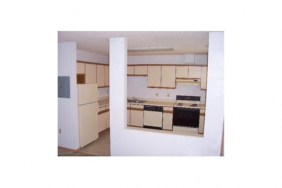 a view of a kitchen with a mirror