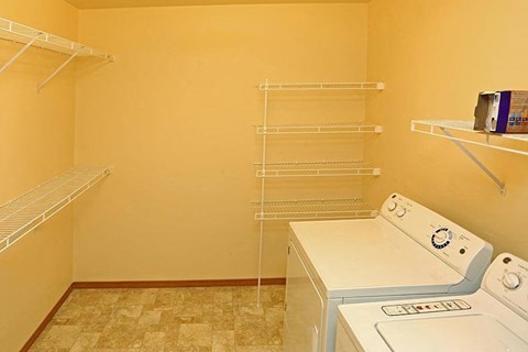 a laundry room with a washer and a dryer