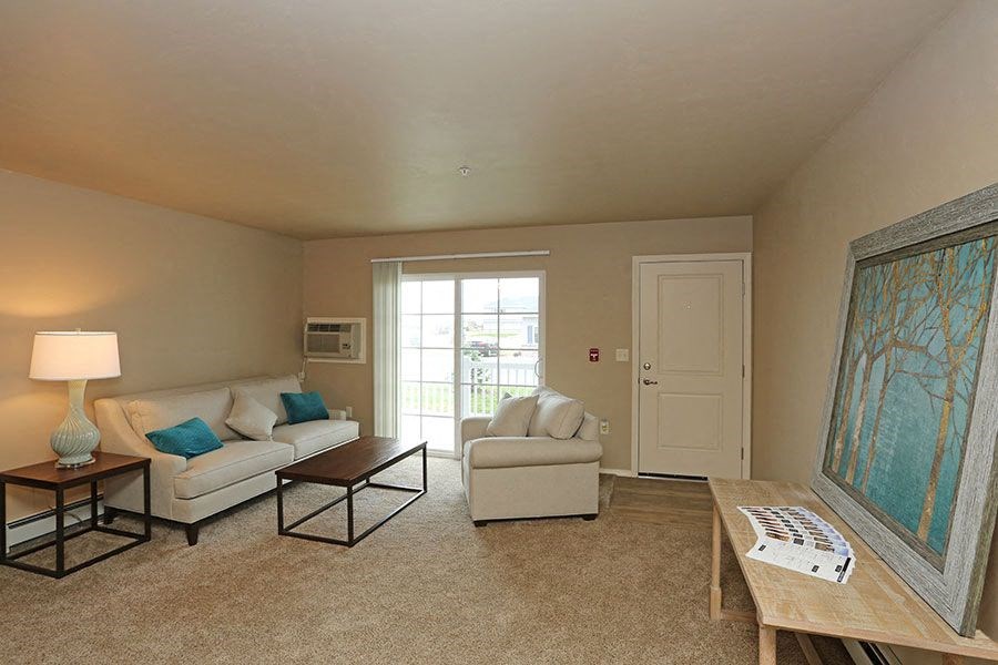 a living room with a couch and a chair