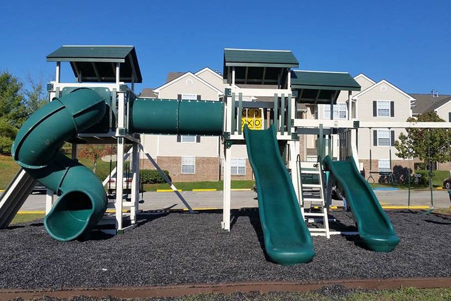 a playground with a set of slides