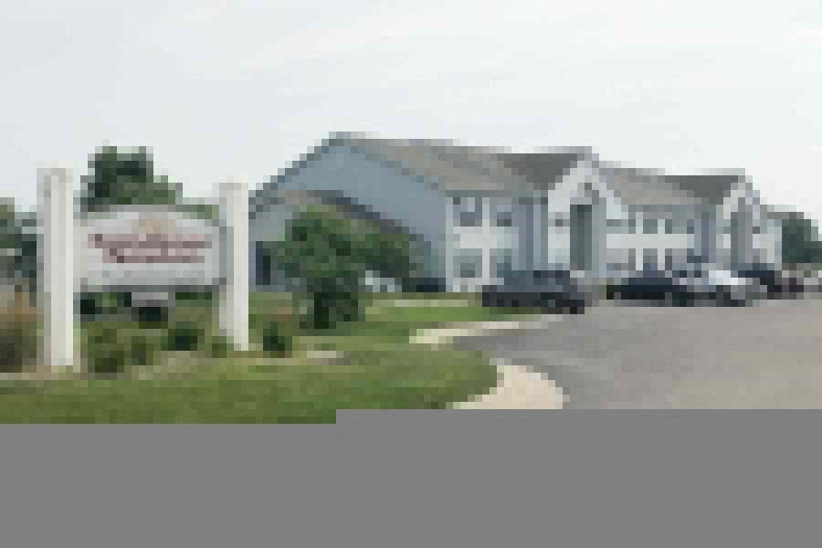 a building with a sign in front of it