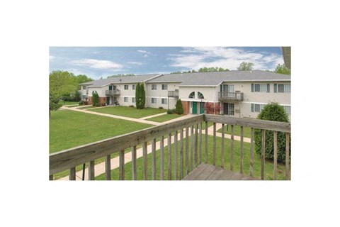 a view of the back of a house from a balcony