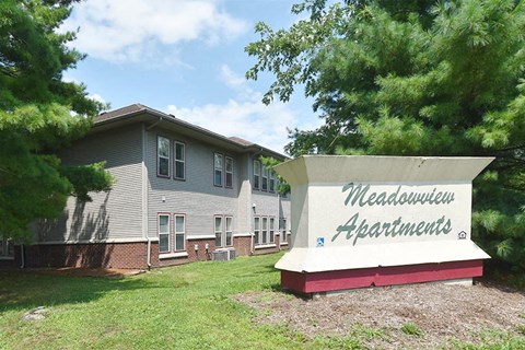 a building with a sign in front of it