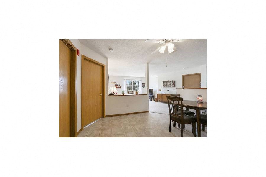 a view of a kitchen and a dining room