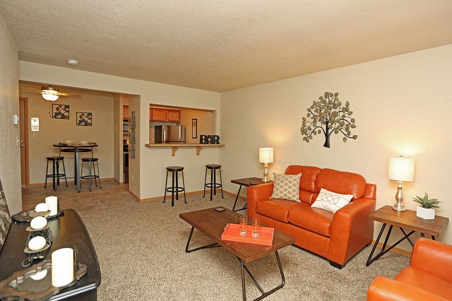 a living room with a couch and a table