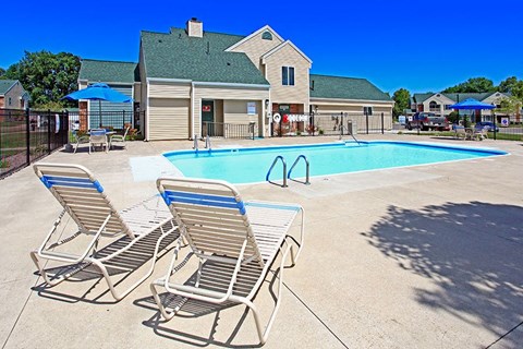 our apartments have a large pool and lounge chairs