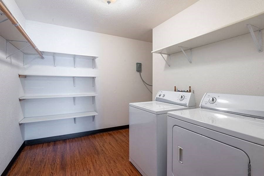 a room with a washer and a dryer in it