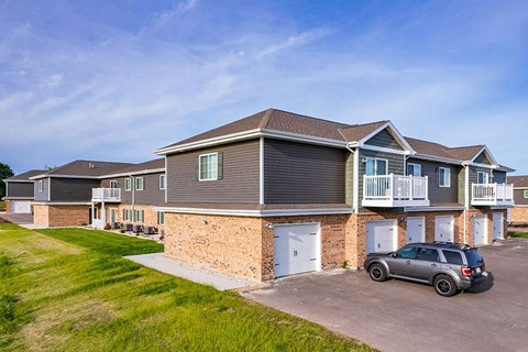 a house with a car parked in front of it