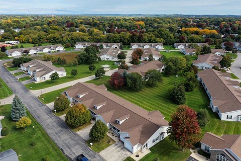 A suburban neighborhood with houses and trees.