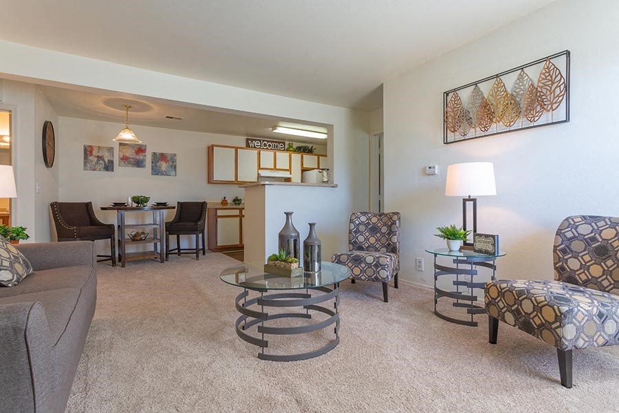 a living room with a couch and a table