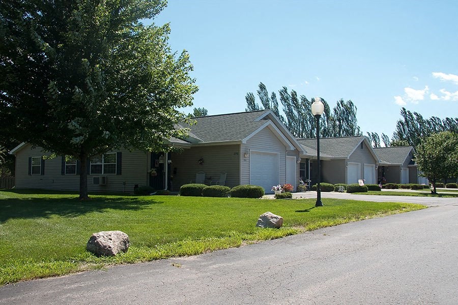 a house with a street lamp in front of it
