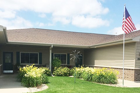a house with an flag in front of it