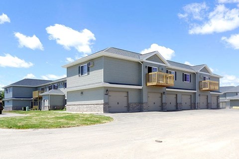 a large house with a garage and a porch