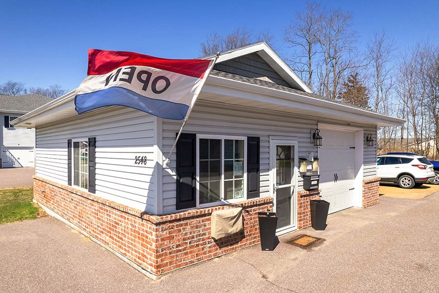 a house with a flag on the front of it