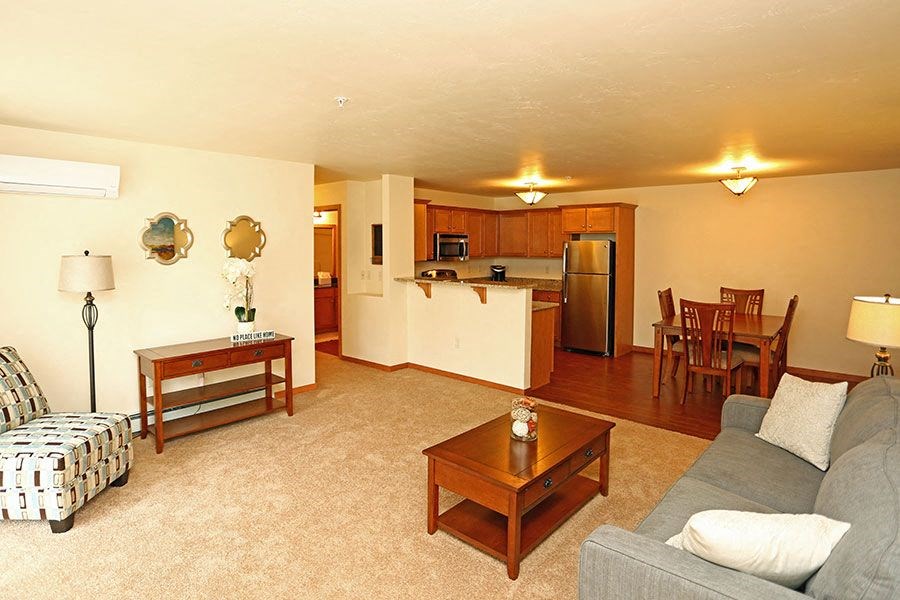 a living room with a couch and a table