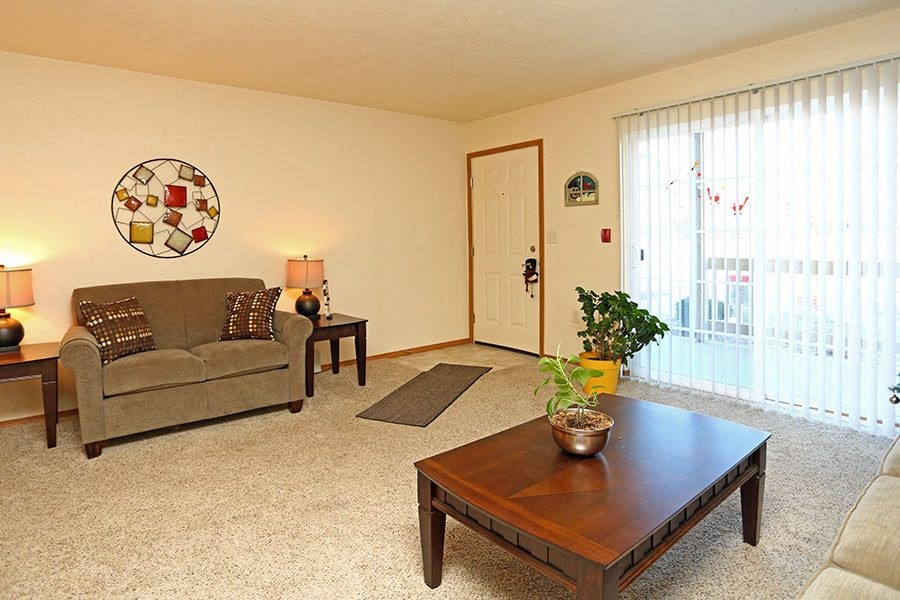 a living room with a couch and a coffee table