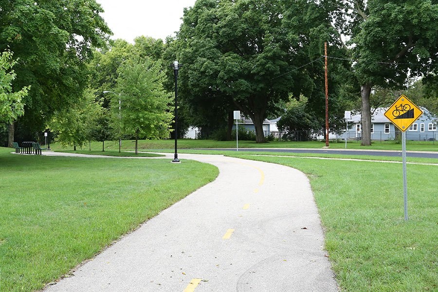 a bike path in the middle of a park