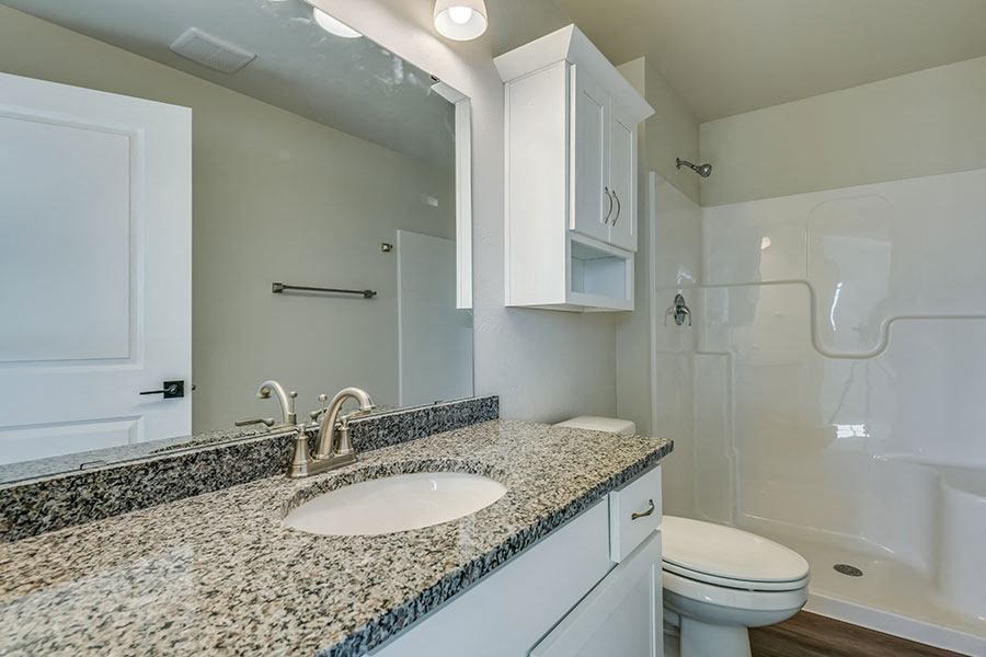 a bathroom with a sink and a toilet