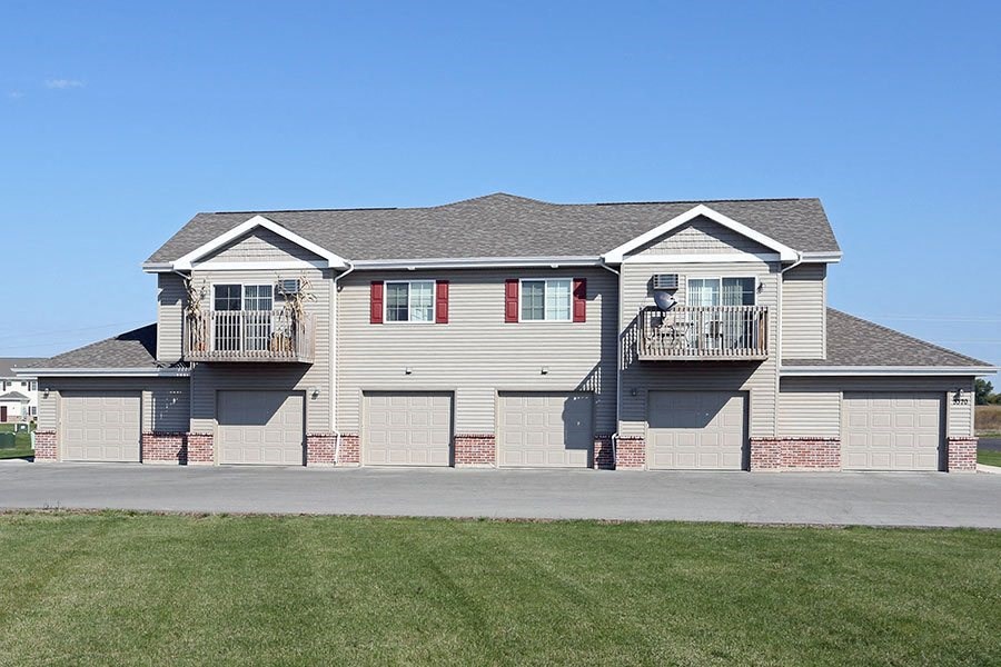 a house with two balconies on the side of it