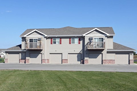 a house with two balconies on the side of it