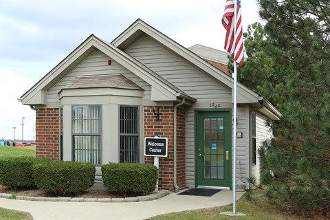 a house with an flag in front of it