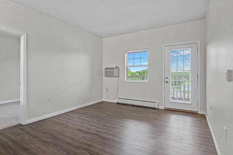 A room with a door and a window.