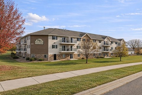 Apartment building with the letters SH on the front.