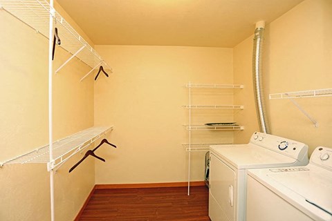 a room with a washer and a dryer in it