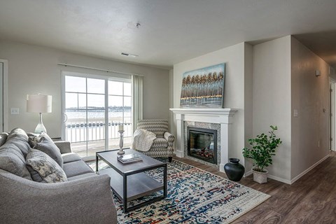 a living room with a fireplace and a couch