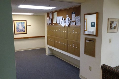 a locker room with a row of lockers