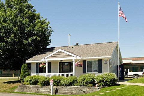 a house with an flag in front of it